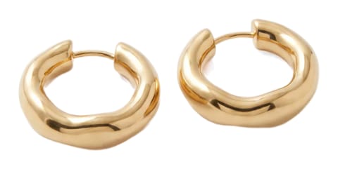 A pair of chunky gold hoop earrings.