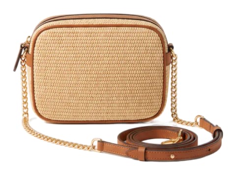 A small woven-straw crossbody bag with tan leather trim.
